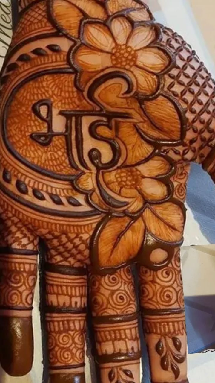 Ganesha Mehndi Design : गणेश चतुर्थी पर लगाइए ये लेटेस्‍ट मेहंदी, इन 5  क्र‍िएट‍िव ड‍िजाइन से भरे पूरे हाथ | Ganesh Chaturthi 2023: Simple and  Creative Ganpati Bappa Mehndi Design - Hindi Boldsky