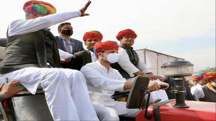 Congress leader Rahul Gandhi drives a tractor