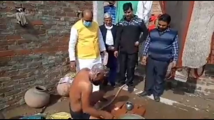 Campaigning BJP MLA Asks Man Bathing