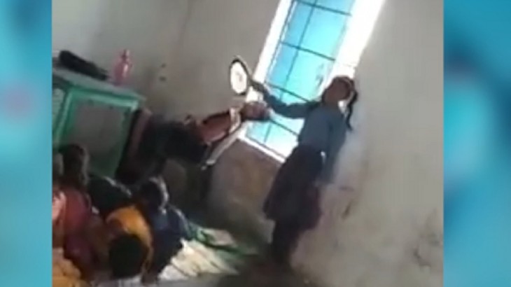 Bihar Teacher resting on chair in class room and girl student facing fan  video viral