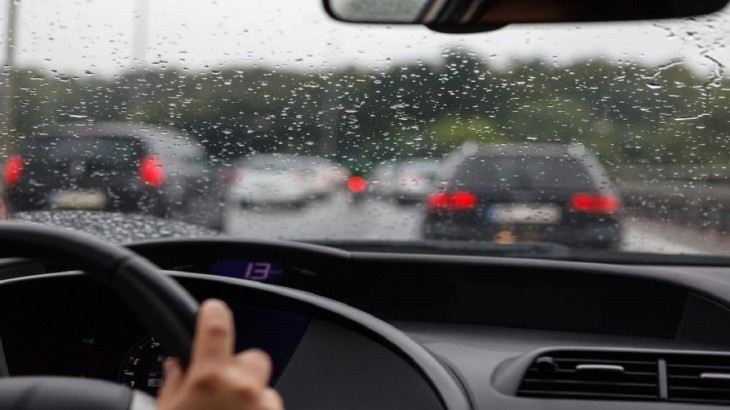 Car Driving In Rainy Season