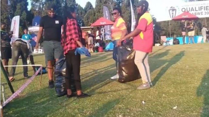 Zimbabwe fans clean ground after match got over against Nepal