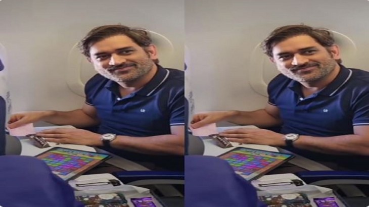 ms dhoni video playing candy crush air hostess offer chocolates